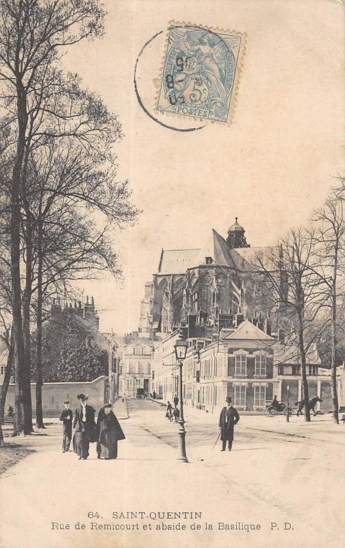 Carte postale ancienne Saint Quentin - Rue De Remicourt Et Abside De La Basilique à Saint-Quentin