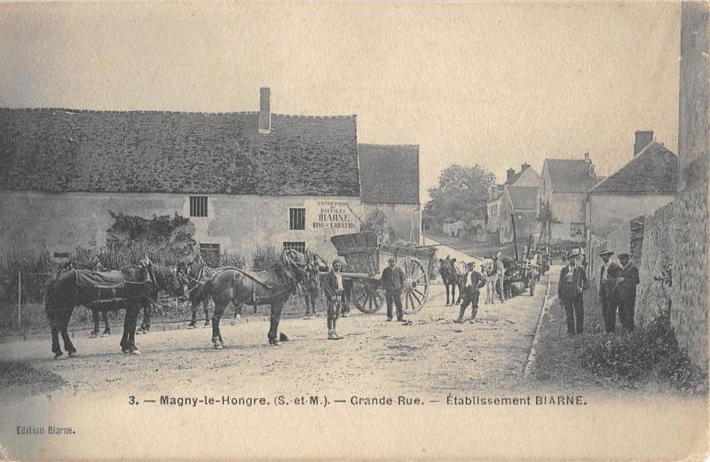 Carte postale ancienne Magny Le Hongre - Grande Rue - Etablissements Biarne - cliché rare à Magny-le-Hongre
