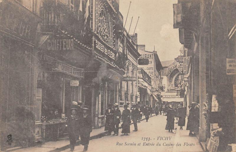 Carte postale ancienne Moulins - Rue Sornin Et Entree Du Casino Ds Fleurs à Moulins